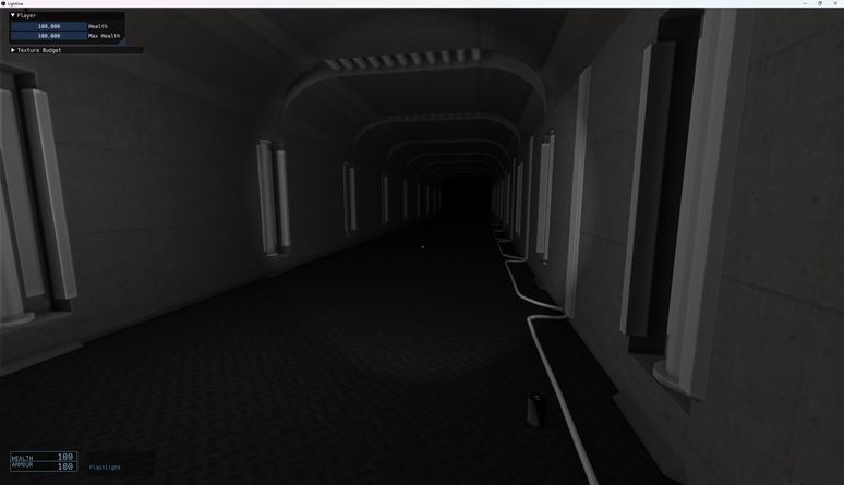 A screenshot of the engine running in game mode, showing a dark sci-fi corridor with a flashlight illuminating the area